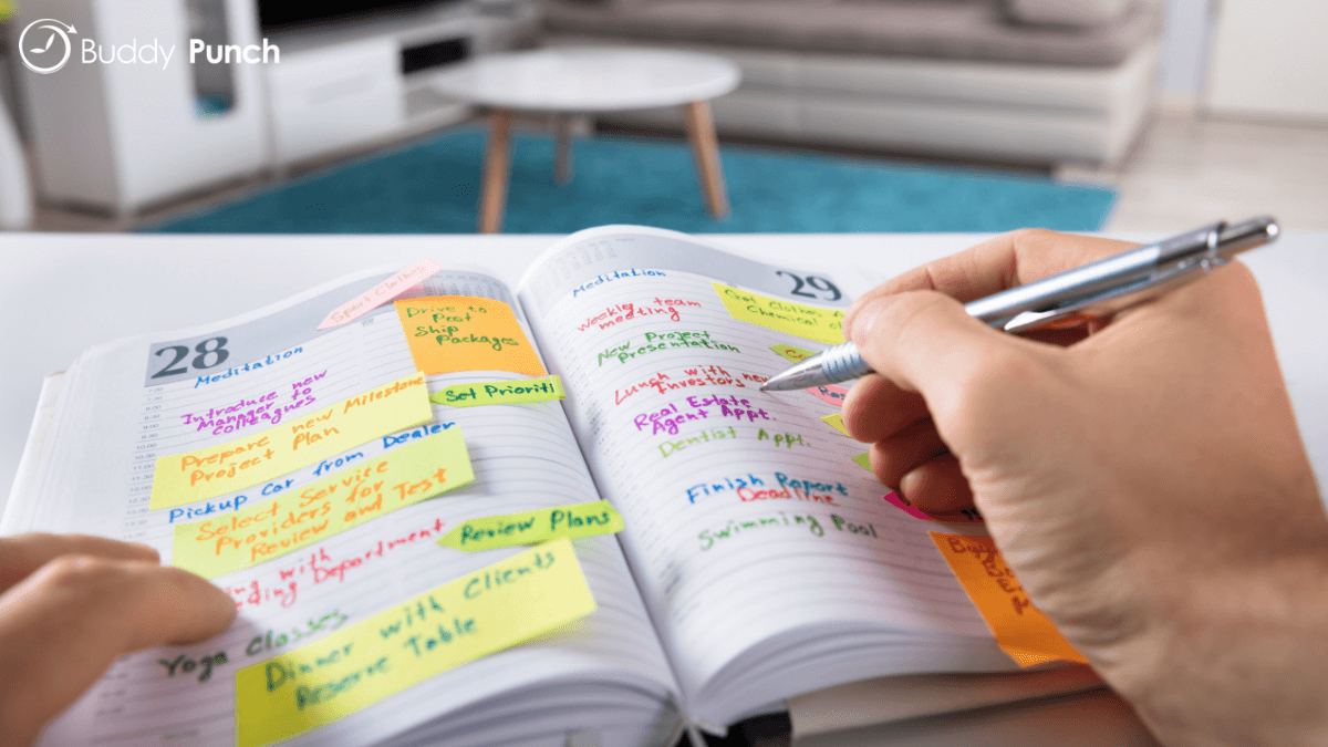 Man creating schedule and blocking out time for work and personal activities. 