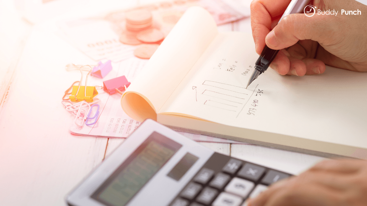 Accountant sitting down to run return on investment analysis.