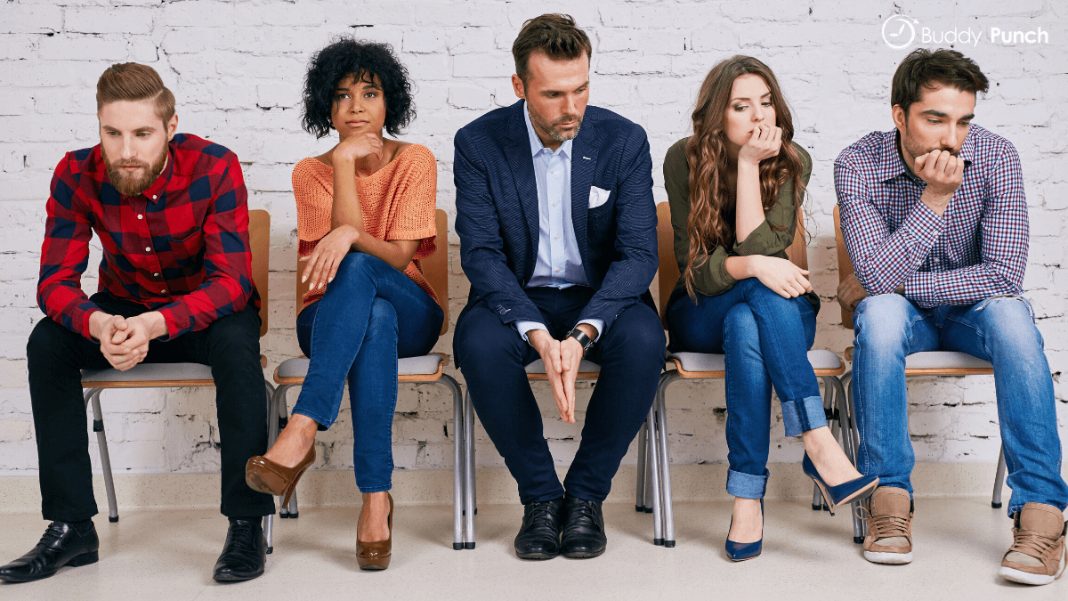 Worried employees contemplating if the new time clock software will be beneficial and help improve their work experience. 