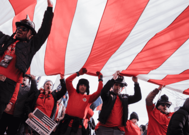 Activists with flag. 