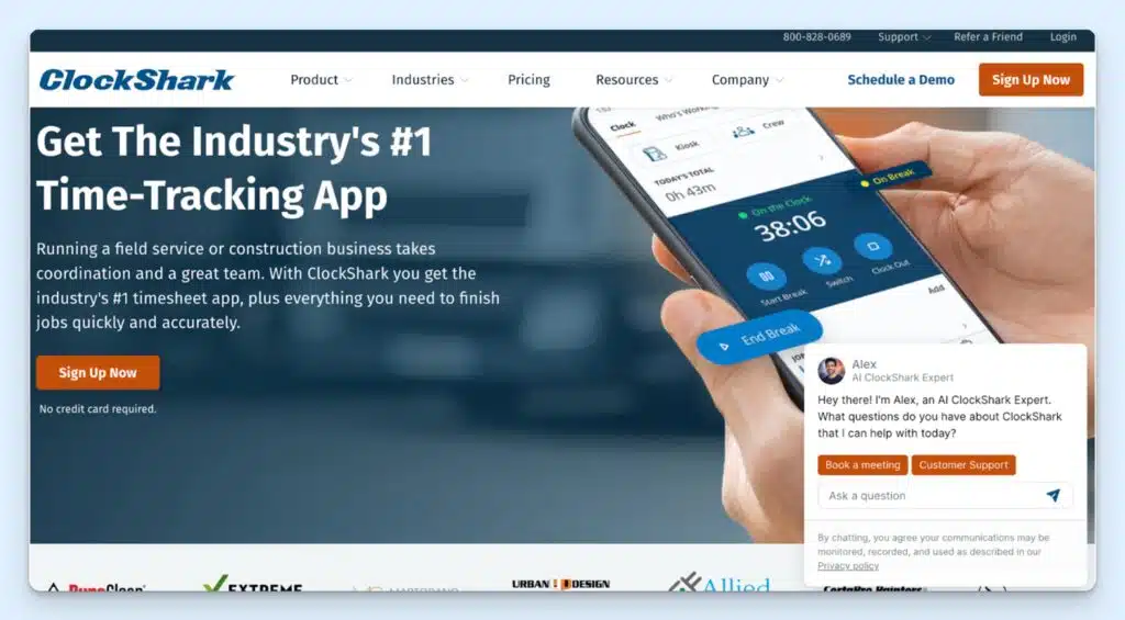 A desktop screenshot of the ClockShark website with a phone screen and a hand